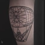 tattoo globo geométrico